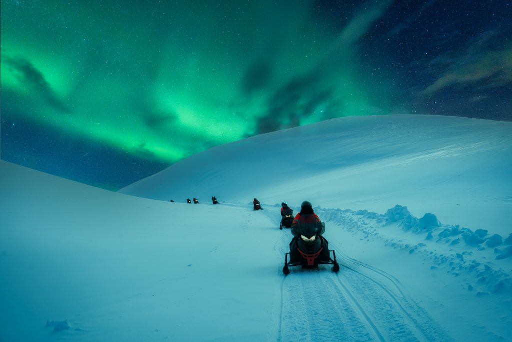 corporate group on a snowmobile adventure